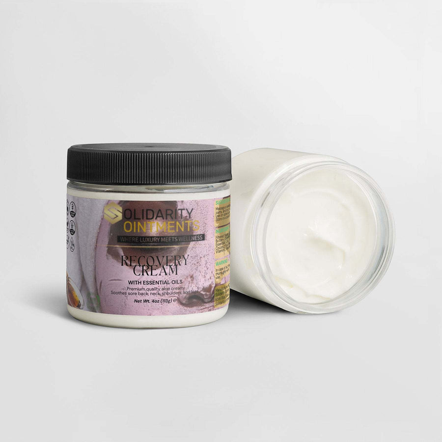 Recovery cream in glass jar with black lid, featuring essential oils for skin hydration and relaxation.